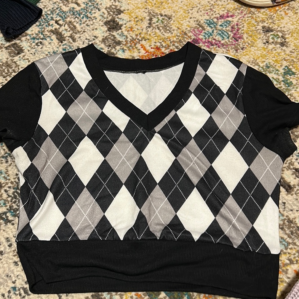 Small black and white patterned top that was rarely wore.